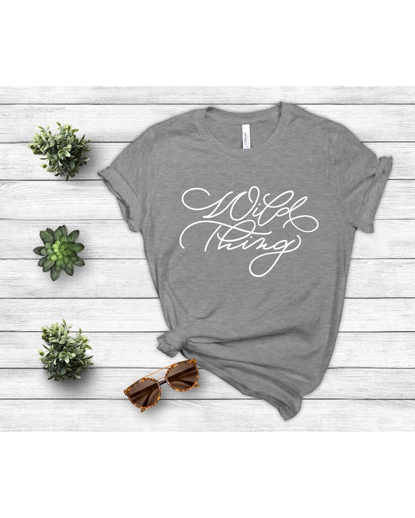 Wild Thing Lettering for decor, accessories or cards.  Design is available as a vector image.  Available art for art licensing

grey shirt with white lettering 

spot calligraphy